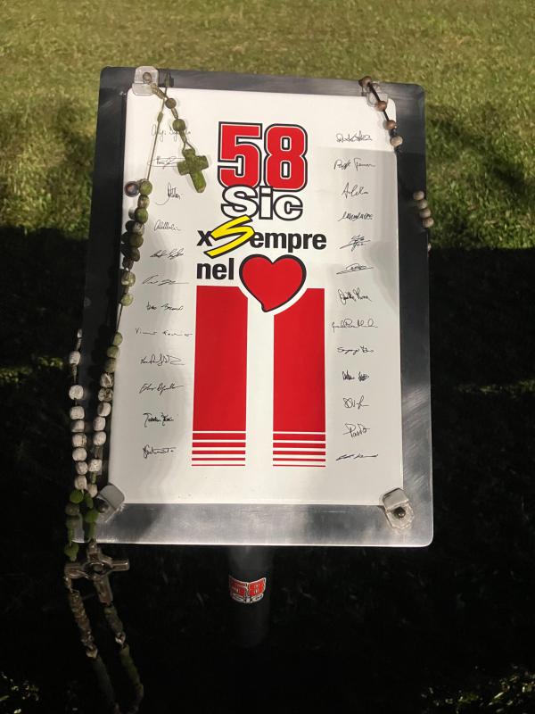 (ID: 23233) We make the annual pilgrimage to the Marco Simoncelli memorial. We were there on the day, we were at the memorial laying ceremont, we will never forget.