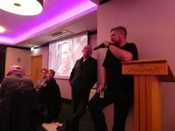 Irish journalist Simon Patterson shows a clip from Dean Harrison superbike on TT course.  He is amazed Dean can take his hands of the bar to make an adjustment at almost 200mph!  He explains why many top riders are moving to use superstock bikes for the superbike class