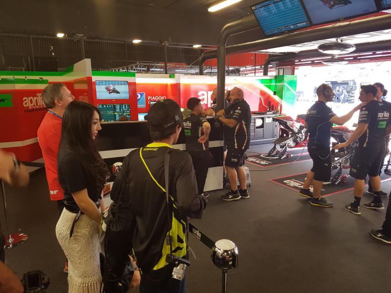 We catch the action inside the Aprilia garage