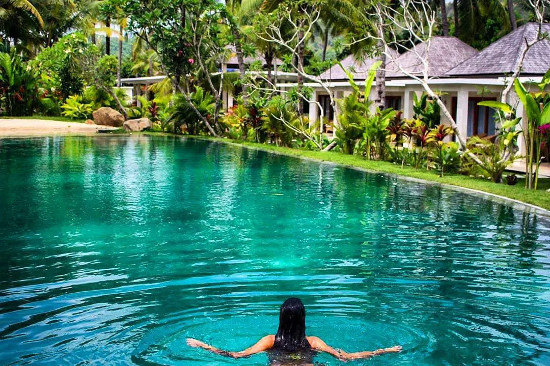 Large pool with sandy beach